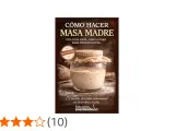 Un frasco de masa madre casera burbujeante, listo para hacer pan artesanal. Guía para principiantes.