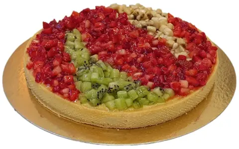 Deliciosas tartas de frutas con fresas, kiwi y plátano, cubiertas de gelatina brillante.
