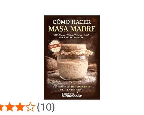 Un frasco de masa madre casera burbujeante, listo para hacer pan artesanal. Guía para principiantes.