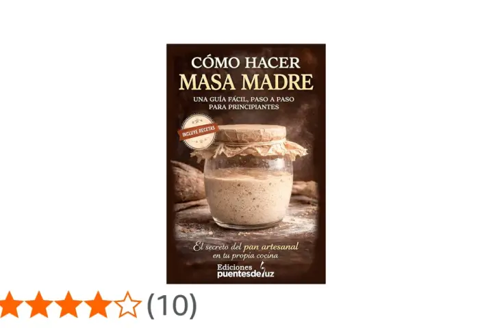 Un frasco de masa madre casera burbujeante, listo para hacer pan artesanal. Guía para principiantes.