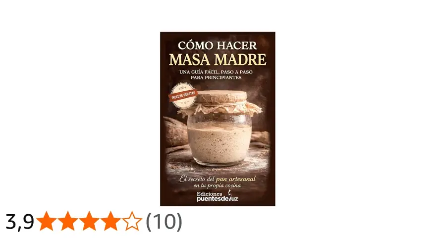 Un frasco de masa madre casera burbujeante, listo para hacer pan artesanal. Guía para principiantes.